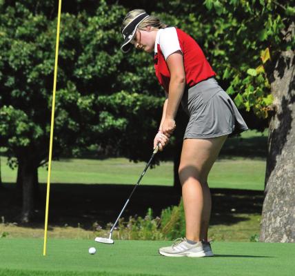 RICHMOND JUNIOR Kennedy Wrisinger attempts a putt on the 18th green Monday afternoon in the Odessa Tournament at Shirkey Golf Course in Richmond. SHAWN RONEY | Staff