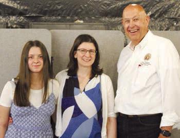 LILLY LADEK (from left) and her mother, Jennifer, stand by State Representative Terry Thompson. SHARON DONAT | Staff