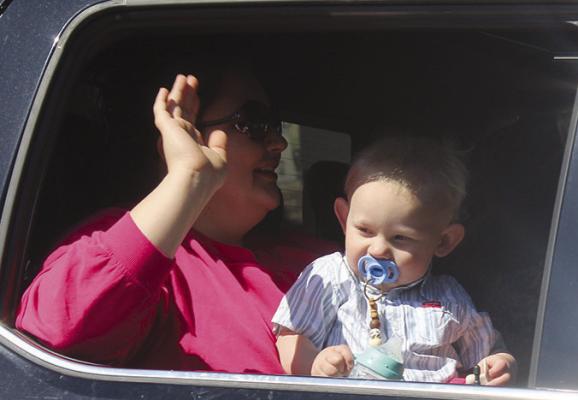WAYLON BAUGHER takes part in the festivities after being named Tiny Mr. Mushroom King.
