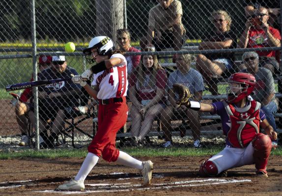 DID SYDNEY APPLEBERRY (left) have walkout music before at-bats like this one when she played high school softball at Richmond in front of her hometown fans? If not, a snippet of hip-hop might’ve fit the bill. SHAWN RONEY | Staff