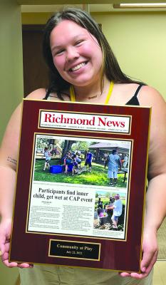 SOPHIA BALES SHOWS the plaque made to be displayed in the Special Needs Services new building. CASSIE HOBECK | Submitted