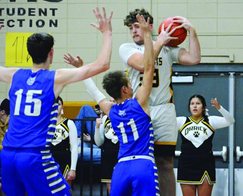 ORRICK’S TUCKER GREER appears to draw contact from Southwest of Livingston County’s William Hughes Nov. 30 at Orrick. SHAWN RONEY | Staff
