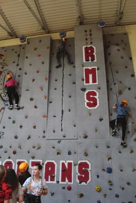 RICHMOND Middle School students climb the climbing wall, which school information states might be one of the largest in the state.
