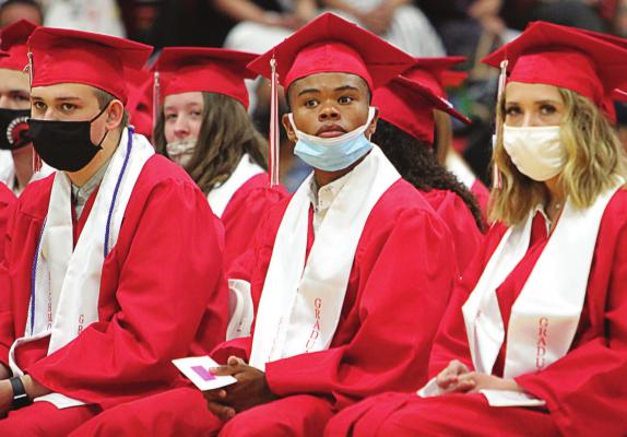 AMONG THE GRADUATES, at center, is Adrian Church. A transfer senior, Church leaves his mark on Richmond High School in several ways, including as an outstanding football player and a track star.