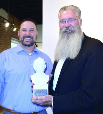 JIMMY CARTER, the 2019 recipient, presents Art Endsley with the 2022 David Whitmer Service Award on Sept. 10 at the Farris Theatre. Submitted