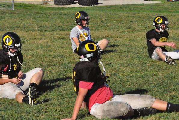 THE BEARCATS stretch Monday on their practice field as they beging prepping for rival NHC. SHAWN RONEY | Staff