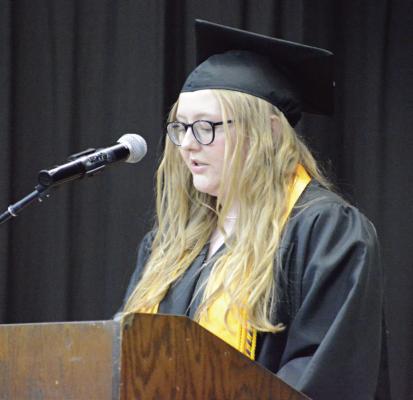 EMMA TRUE, one of two Latin honor student speakers, addresses her fellow graduates and the crowd.