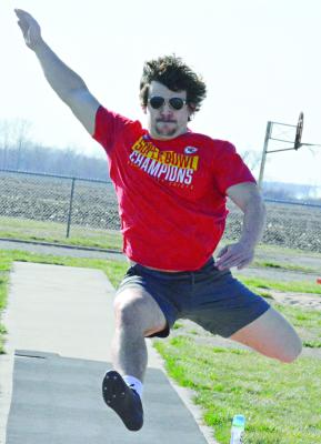 ORRICK SENIOR Jaxon Miller, back to participating in track and field after being sidelined last season while recovering from surgery, jumps March 11 as practice wraps. SHAWN RONEY | Staff