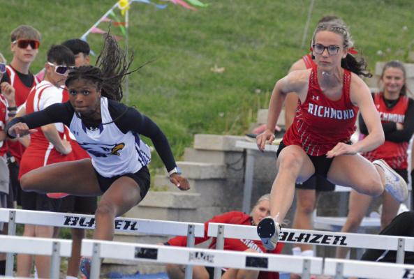 SOON-TO-BE Richmond graduate Kaylee King (right) fights for the lead early in the varsity girls 100-meter high hurdles at the Missouri River Valley Conference-East Division meet. SHAWN RONEY | Staff