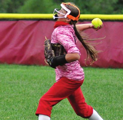RICHMOND SOPHOMORE Trinidy Fisk heaves the ball from right field to help the Spartans protect their shutout Tuesday at Southview Park.SHAWN RONEY | Staff