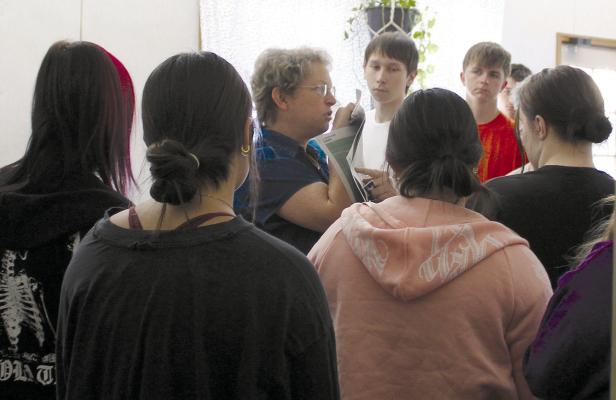 RICHMOND HIGH SCHOOL Work Force Math teacher Renee Seba shows students delinquent property tax list in the Richmond News. SHARON DONAT | Staff