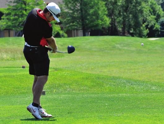 COVERING AREA GOLFERS Timmy Hamilton, seen here teeing off with a Monday at Drumm Farm Golf Course in Independence provides a physically driver, and Dylan Comstock on foot during a Kansas City Junior Tour stop rigorous, emotionally satisfying walk. SHAWN RONEY | Staff