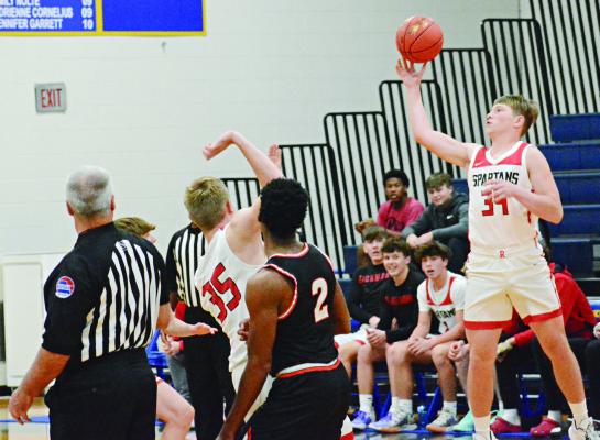 FIVE QUARTERS before grabbing Richmond’s game-sealing rebound against Oak Grove Dec. 9 at the Husker Classic in Higginsville, junior Tristan McCoy reaches for the opening tipoff. SHAWN RONEY | Staff