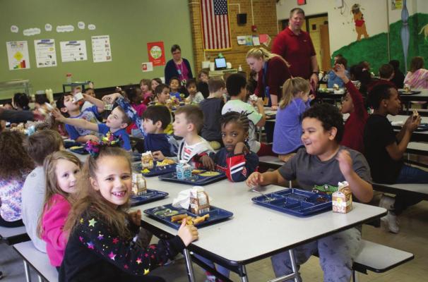 WRIGHT ELEMENTARY SCHOOL receives a grant so all students eat lunch free. The Flavor Bar’s most popular items are hot sauce and banana peppers. AMY MAYER | Harvest Public Media