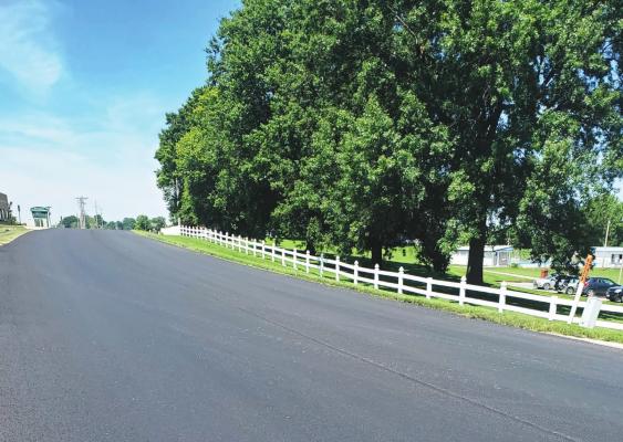 TO GET STREETS this year to look as good as this one, done last year, a few detours will need to occur.