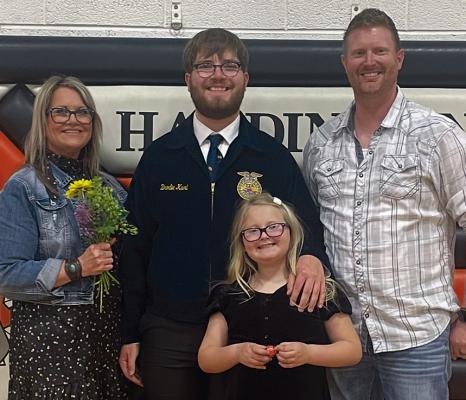 KRISTY MCBEE (left) is supported by her family as she helps students succeed at Hardin-Central High School. Submitted