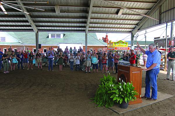 BEFORE A CROWD of people who are not wearing masks or social distancing at the Missouri State Fair in Sedalia on Thursday, Gov. Mike Parson says he supports wearing mask, but wants people to take “personal responsibility regarding whether they wear masks.