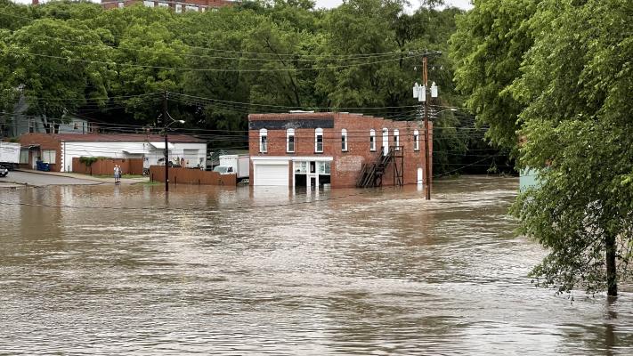 The hitch lot and buildings along South Street were caught off guard as flash flooding hit the area overnight. Photo by Brian Rice.