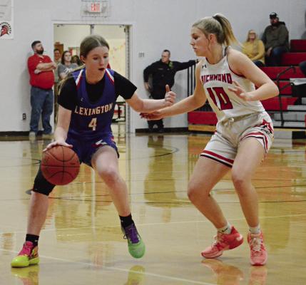 RICHMOND CONTINUES to utilize man-to-man defense, as Kaylee Pugh shows by guarding Lexington’s Zoey Earnest Feb. 9 at Richmond. SHAWN RONEY | Staff