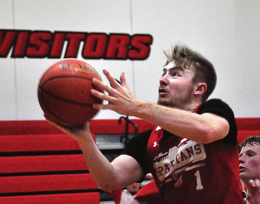 SPENCER WOLF, one of two seniors in the gym when boys basketball practices start in November because of Richmond’s Class 2 state semifinal run in 11-man football, goes for a layup Nov. 22. SHAWN RONEY | Staff