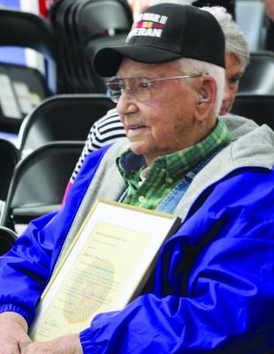 GRAHAM C. MYERS JR., 98, accepts recognition from American Legion Post 237 as Ray County’s oldest living World War II veteran. SHARON DONAT | Staff