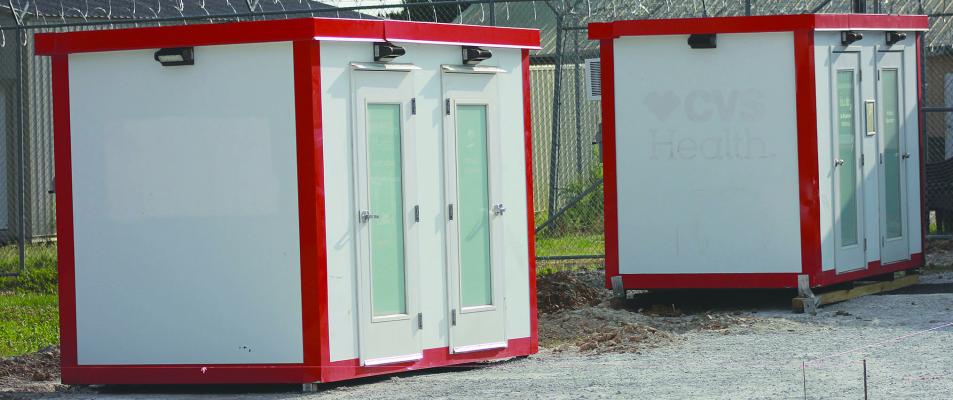 MYSTERY BOXES sit behind jail in Henrietta. SOPHIA BALES | Staff