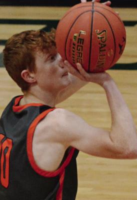 HARDIN-CENTRAL junior Kaden McGinnis attempts a free throw during the Bulldogs’ season opener with Polo.
