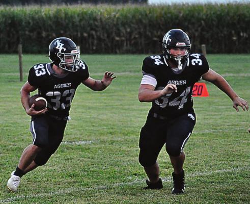 BRAYDEN SCHICK, seen here carrying the football Sept. 3 at Norborne against Knox County, gets the call 33 times during Norborne Hardin-Central’s 40-34 double-overtime loss to Braymer/Breckenridge Sept. 24 at Braymer. SHAWN RONEY | Staff