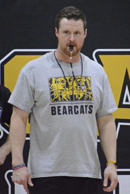 SETH SMITH, the new head track and field coach for Orrick High School, puts his Bearcats through their paces. SHAWN RONEY | Staff