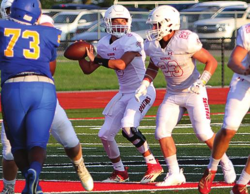 AT THE JAMBOREE in Odessa – a three-way practice session among Richmond, Odessa and Lincoln College Preparatroy Academy – Richmond senior quarterback Keyshaun Elliott drops back to pass.
