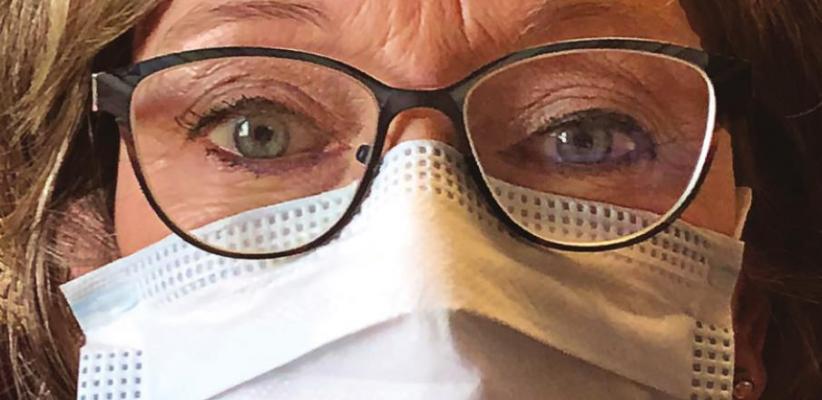 LAWMAKERS IN MASKS may not surprise some taxpayers, but in this situation, Rep. Peggy McGaugh wears a mask due to COVID-19 concerns.