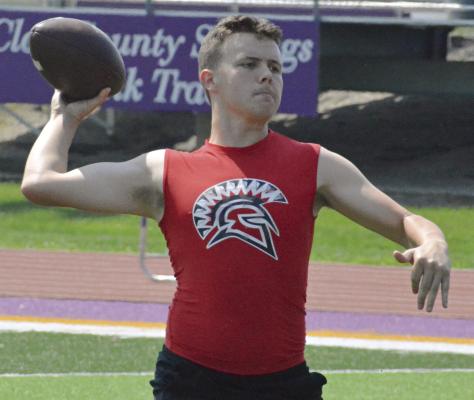 JAYDEN PEARSON rears back to throw the football as Richmond participates in high school 7-on-7 scrimmages. The session this week was the first of three Tuesday morning sessions scheduled this month for Pearson and his fellow Spartans at Kearney High School. SHAWN RONEY | Staff