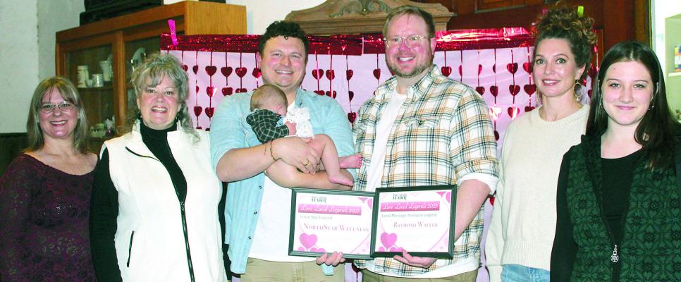 NORTHSTAR WELLNESS owner Raymond Waller (third from right) is joined by family and friends after the business is named Best Spa and Waller is recognized as Best Massage Therapist, during the annual Love Local Legends ceremony. MIRANDA JAMISON | Staff
