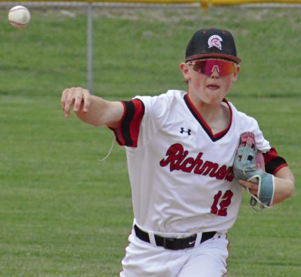 INFIELDER CHASE ADAMS throws to first base during Richmond’s varsity baseball meeting with Benton, a St. Joseph-based school. Benton was recently state-ranked by the Missouri High School Baseball Coaches Association. SHAWN RONEY | Staff