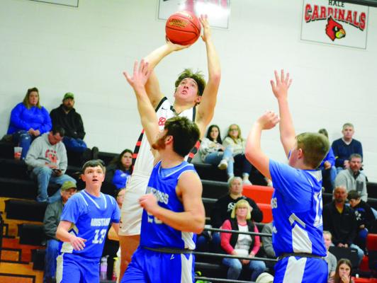 HARDIN-CENTRAL junior Jesse Doyle goes up for a first-half jump shot during the Bulldogs’ 69-50 Dec. 1 home win over Tri-County, a Jamesport-based public school. SHAWN RONEY | Staff
