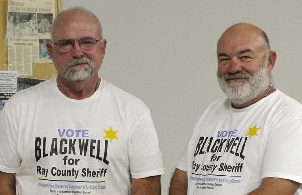 RAY COUNTY SHERIFF candidate Gary Blackwell (left) stands with proposed undersheriff Randy Miller after speaking with the crowd. SHARON DONAT | Staff