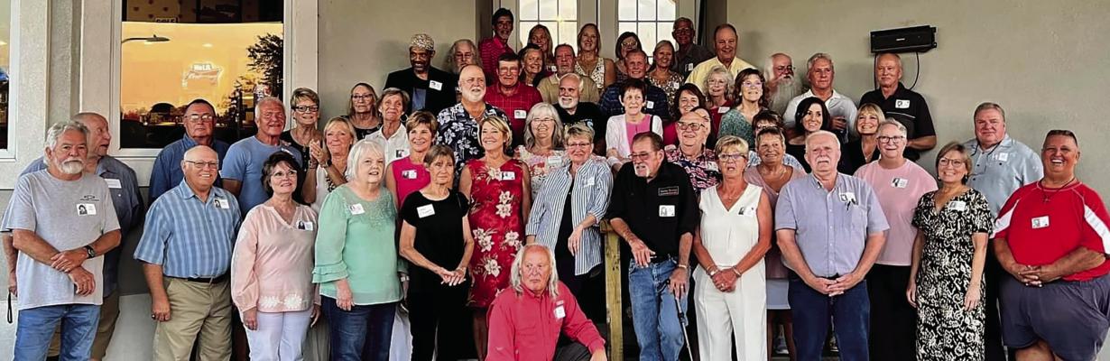 ALUMNI OF RICHMOND High School’s 1974 graduating class convene at Shirkey Golf Course to celebrate their momentous 50th class reunion. Amidst the festivities, the class members come together to proudly present a generous $1,000 check to the Richmond Educational Foundation. NANCY JONES | Submitted