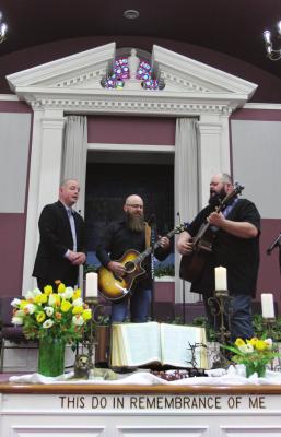 SPIRITUAL MUSIC plays in the sanctuary. Harmonizing, from left, are chief vocalist Jeremy Pope, and vocalists/guitarists James Wynn and Tim Bovard. J.C. VENTIMIGLIA | Staff