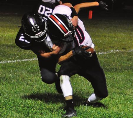 SENIOR NATE HAWKINS, seen here making a tackle, is one of two seniors Norborne Hardin-Central lose to graduation from this season’s 6-4 campaign. SHAWN RONEY | Staff