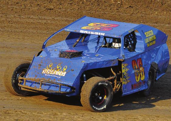 RAY COUNTIAN Doug Brisbin handles a tough corner during his heat race July 3 at Valley Speedway. SHAWN RONEY | Staff