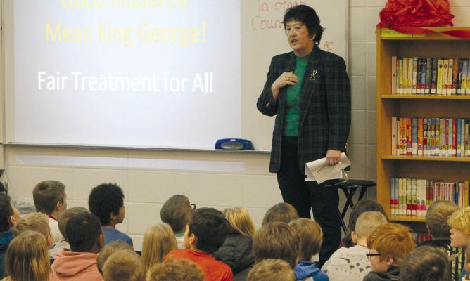 RAY COUNTY JUDGE Lori Baskins leads a classroom discussion with Sunrise Elementary third graders during a lesson on justice and government. SHARON DONAT | Staff