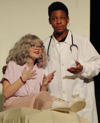 KALIE HENDRIX (left) is poisoned by the doctor, played by Zavier Davis, in a twisted soap opera plot.