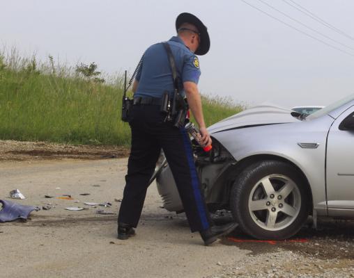 Sergeant D. Kline, MSHP, conducts accident investigation. MIRANDA JAMISON | Staff