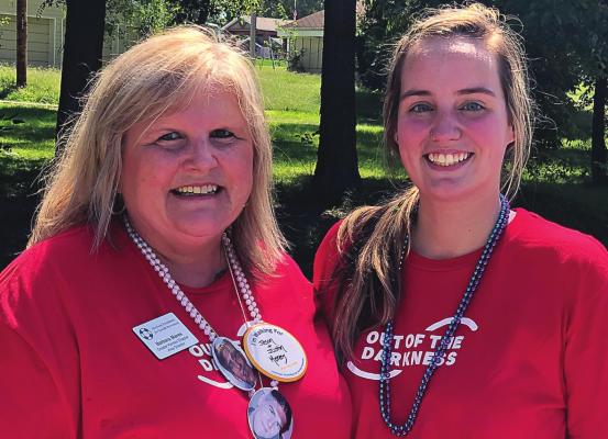 BARB MARES and Samara Gant lead the fight in Ray County to prevent suicide by walking at last year’s event. Gant chairs the county’s walk from 10 a.m. to 1 p.m. Sept. 12 at Hardin-Central.