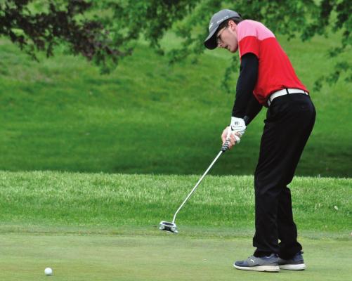 RICHMOND JUNIOR Aiden Bowman putts on the ninth green in Class 2 District 4 Tournament Competition Monday afternoon at Shirkey Golf Course en route to a state-qualifying finish. SHAWN RONEY | Staff