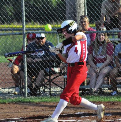 SOPHOMORE SYDNEY APPLEBERRY takes a cut at a pitch in the bottom of the first inning of Richmond’s 18-3 rout of Lexington in three innings Monday at Southview Park in Richmond. SHAWN RONEY | Staff