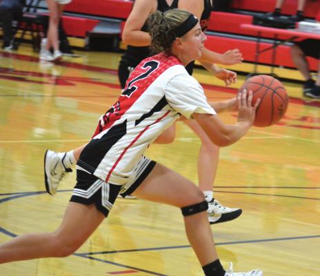 SYDNEY APPLEBERRY looks to pass as the Spartans push the ball down the court June 30 during some offseason scrimmaging with Braymer at Richmond High School. SHAWN RONEY | Staff