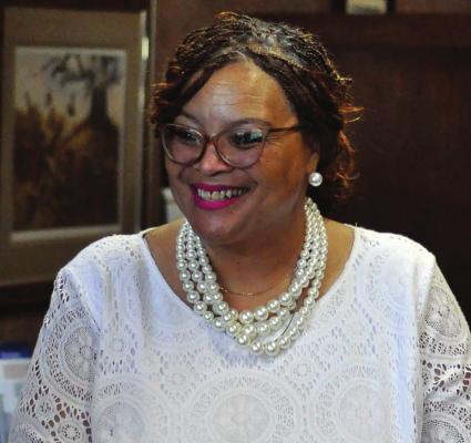 BRIDGE OF HOPE CEO Connie Taylor celebrates paying off the 15-year building debt after less than six months SHAWN RONEY | Staff