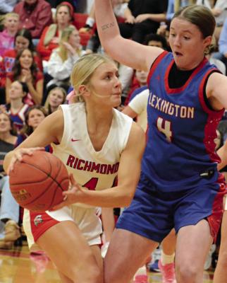 A FEW QUARTERS before sinking the game-winning shot, Ella Steele (left) looks to score while guarded by Zoey Earnest. SHAWN RONEY | Staff