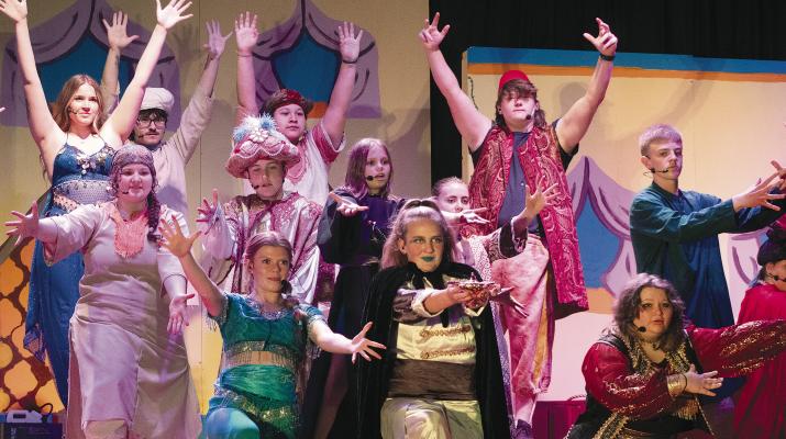 CAST MEMBERS work through a group number during a rehearsal of Aladdin at Orrick, preparing for this past weekend’s performance.